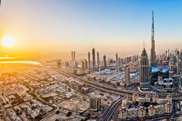 Aerial view of a bustling business district at sunset.