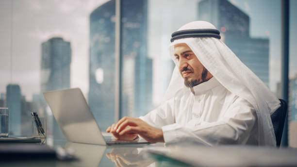 A person working on freelance projects at home while employed in UAE